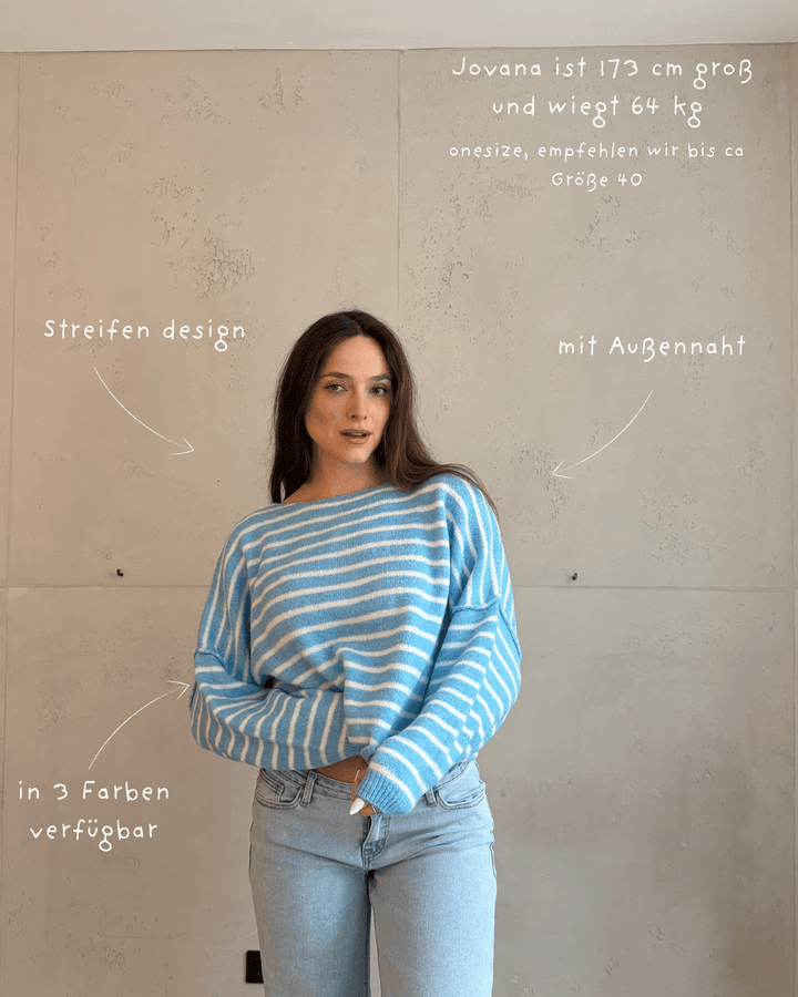 Cowan - Striped sweater with outward seam