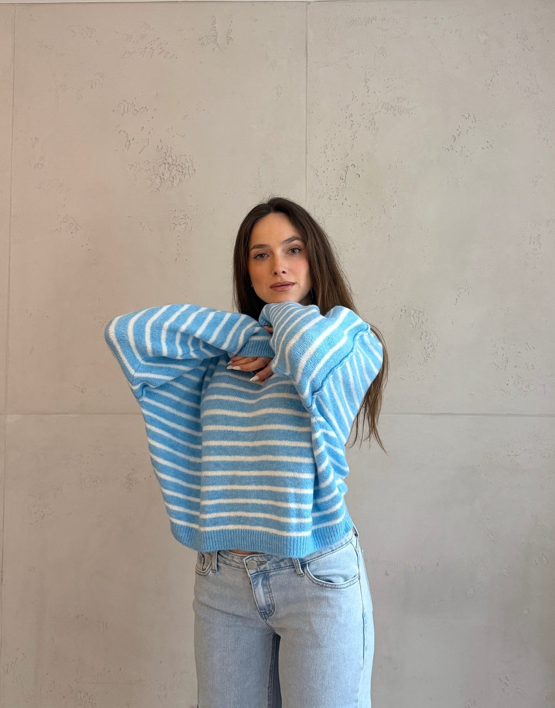 Cowan - Striped sweater with outward seam